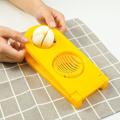 2006 2 in 1 Double Cut Boiled Egg cutter with stainless steel wire for easy slicing of boiled eggs. DeoDap